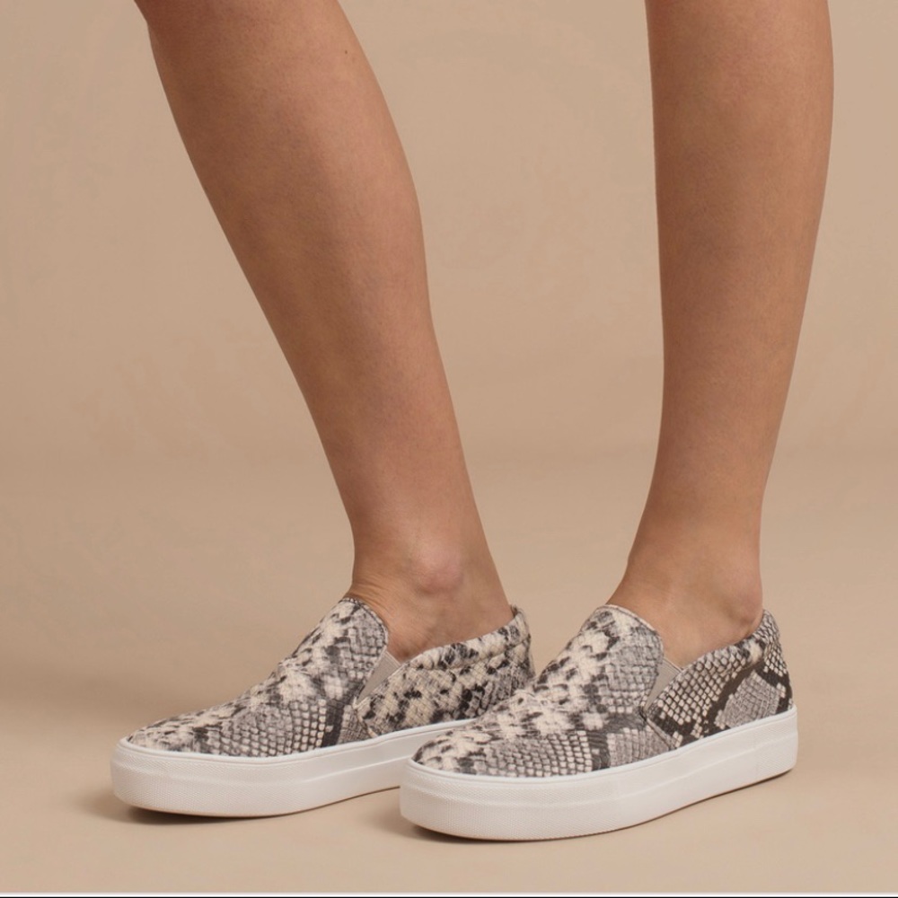 Steve Madden snakeskin slip ons size 8.5